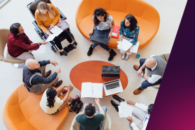 A picture of a focus group ( a group of people sharing their opinions to benefit the business )